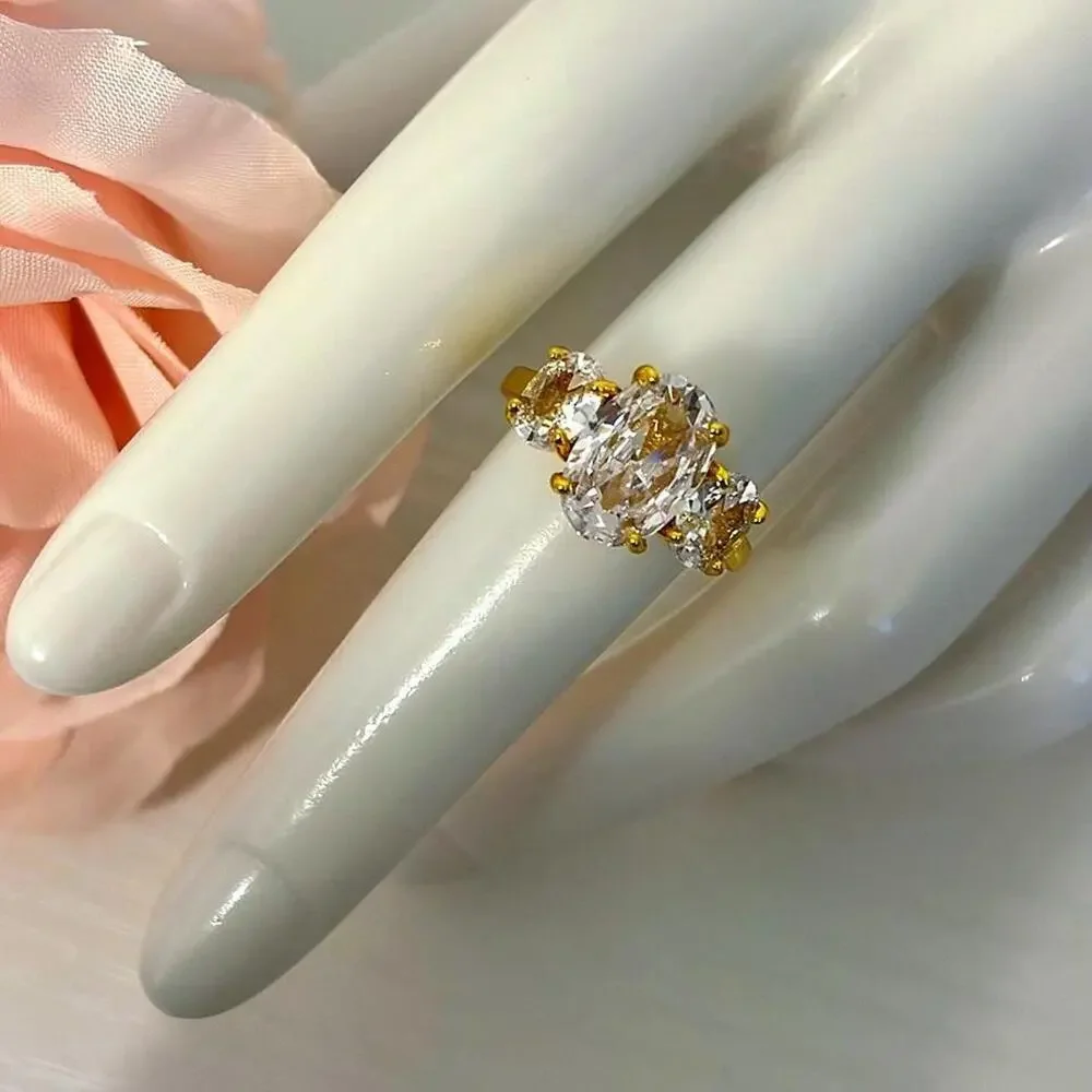 18k gold plated ring with 3 prong CZ diamonds